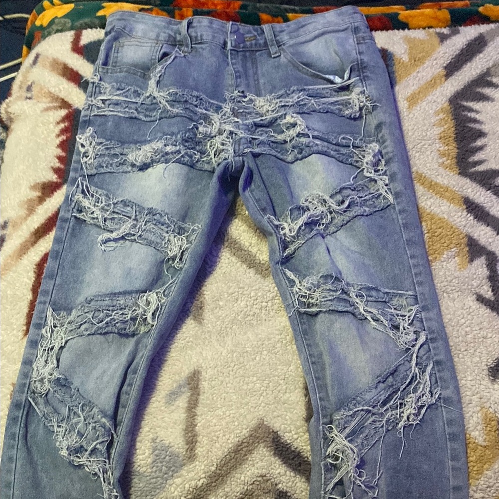 Distressed Blue Denim Jeans